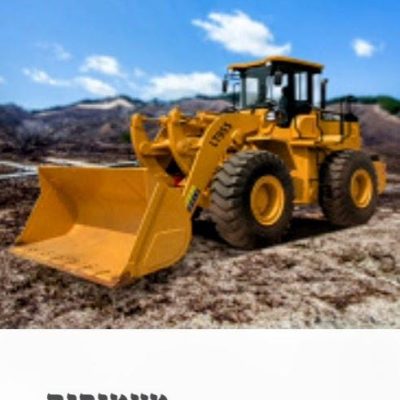 מעמיס אופני צהוב גדול באתר עבודה (מעמיסים)